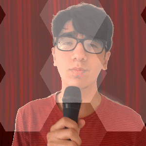 Man Wearing Glasses Holding Microphone