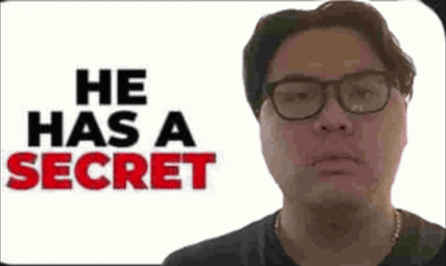 Man Wearing Glasses in Front of Secret Sign