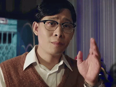 Man Wearing Glasses Making Funny Face GIF