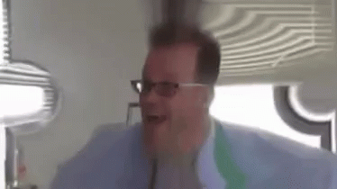Man Wearing Glasses Making Funny Face GIF