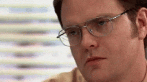 Man Wearing Glasses Making Serious Face