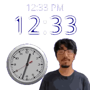 Man Wearing Glasses Next to 12:33 PM Clock