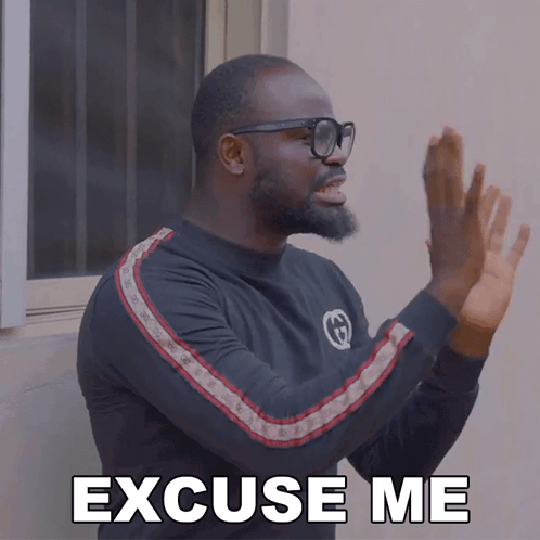 Man Wearing Glasses Saying Excuse Me GIF