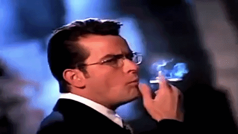 Man Wearing Glasses Smoking Cigarette GIF