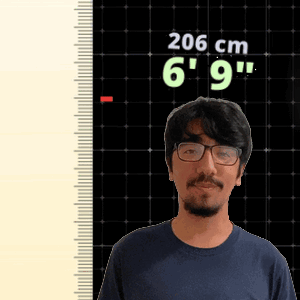 Man Wearing Glasses Standing by 206cm Ruler