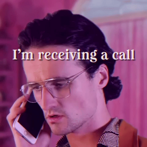 Man Wearing Glasses Talking On Phone GIF