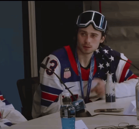 Man Wearing Goggles and Jersey Number 13