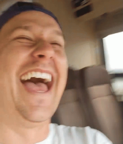 Man Wearing Green Cap Laughing GIF