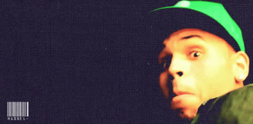Man Wearing Green Hat Mussell