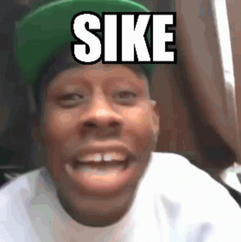 Man Wearing Green Sike Hat