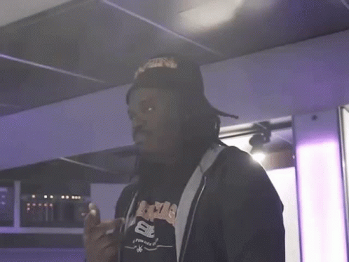 Man Wearing Hat and A&E Shirt