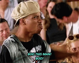 Man Wearing Hat and Sunglasses Saying Boo