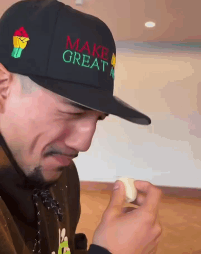Man Wearing Hat Saying Make Great