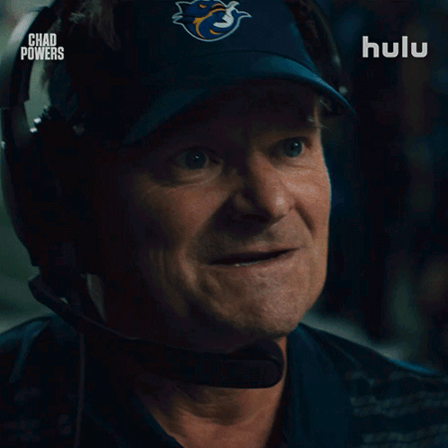Man Wearing Hat Saying Something Weird