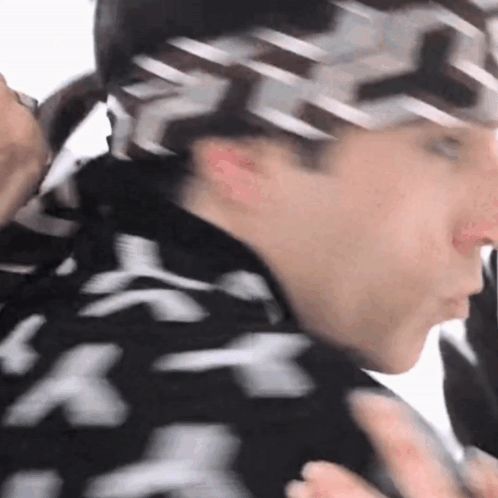 Man Wearing Headband and Black White Shirt