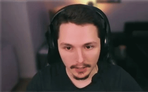 Man Wearing Headphones and Black Shirt