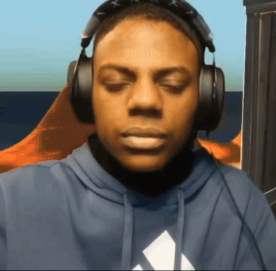 Man Wearing Headphones and Blue Adidas Hoodie