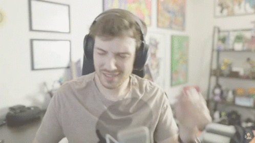 Man Wearing Headphones and Cat T-Shirt