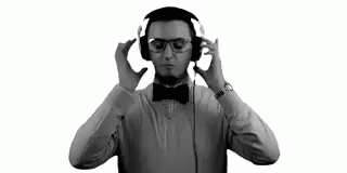 Man Wearing Headphones and Glasses