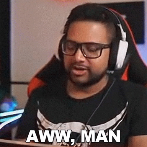 Man Wearing Headphones and Glasses Making Funny Face