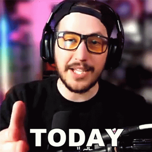 Man Wearing Headphones And Glasses Pointing At Today GIF