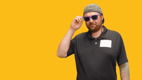 Man Wearing Headphones and Hat Saying Oh My God