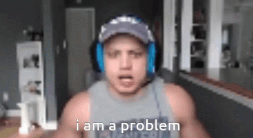 Man Wearing Headphones and Hat Says I Am a Problem