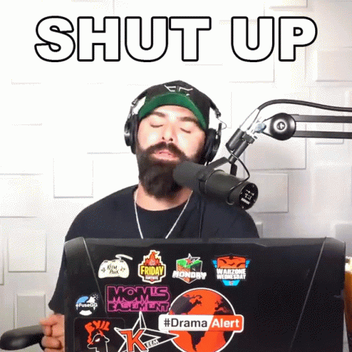 Man Wearing Headphones and Hat With Shut Up