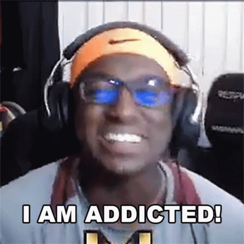 Man Wearing Headphones and Headband Says I Am Addicted