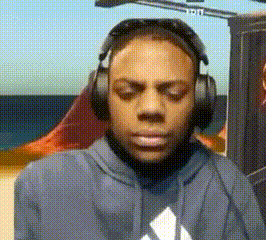 Man Wearing Headphones and Hoodie