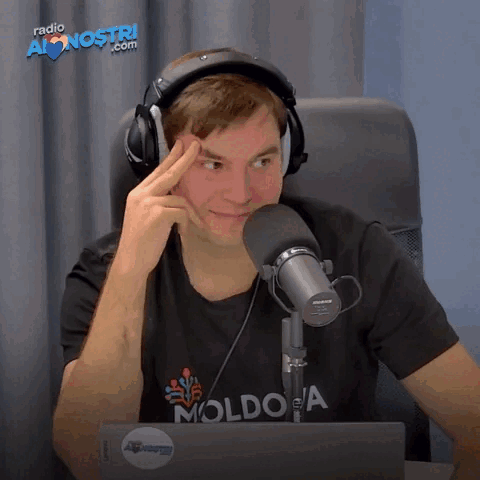 Man Wearing Headphones and Moldo T-Shirt