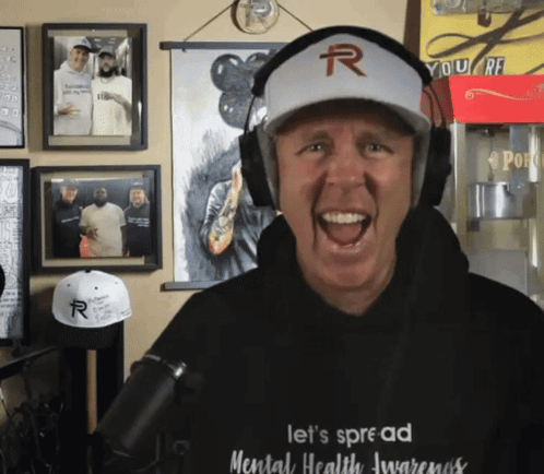 Man Wearing Headphones And R Hat GIF