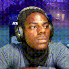 Man Wearing Headphones and R Scarf