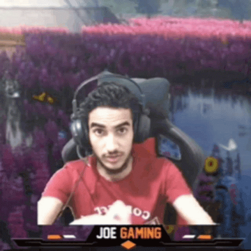 Man Wearing Headphones and Red Shirt With Name Joe Gaming