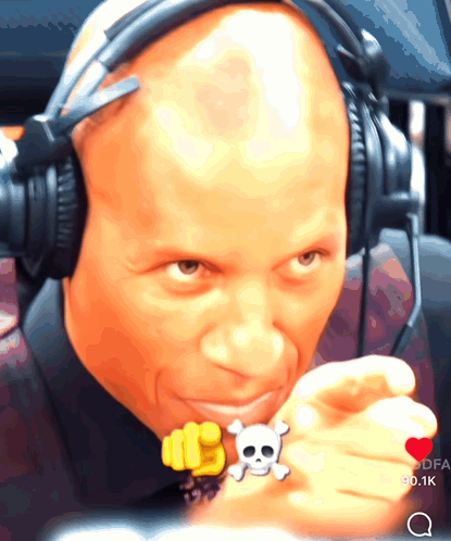 Man Wearing Headphones And Skull Ring GIF