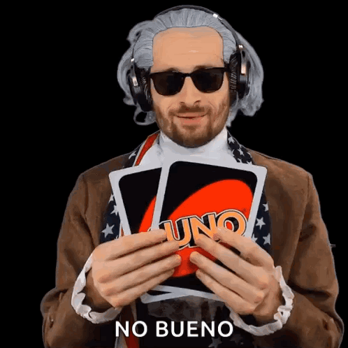 Man Wearing Headphones and Sunglasses Holding Uno Card