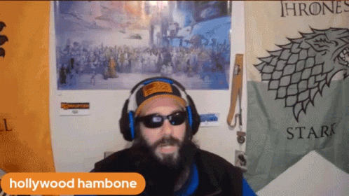 Man Wearing Headphones and Sunglasses Near Thrones Poster