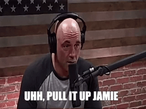 Man Wearing Headphones at Microphone Saying Pull It Up Jamie