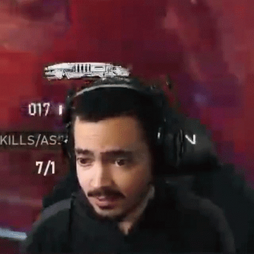 Man Wearing Headphones Facing Screen Kills / As