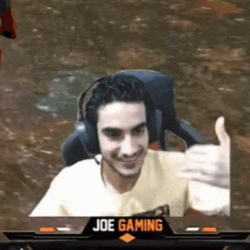 Man Wearing Headphones Giving Thumbs Up in Front of Joe Gaming Logo