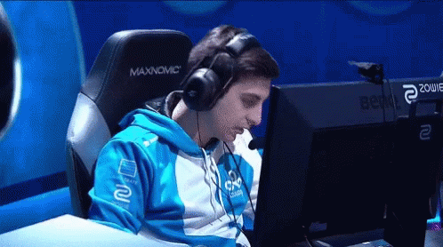Man Wearing Headphones In Front Of Computer GIF