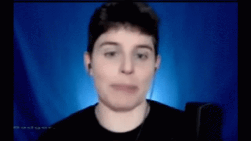 Man Wearing Headphones Making Funny Face at Microphone