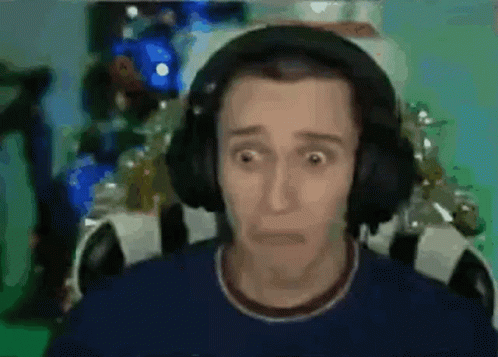 Man Wearing Headphones Making Funny Face