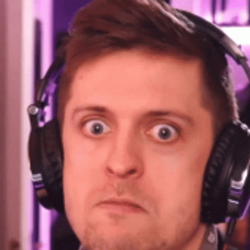 Man Wearing Headphones Making Funny Face