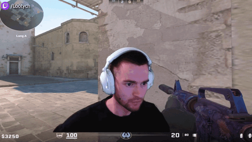 Man Wearing Headphones Playing Video Game With Twitch Logo