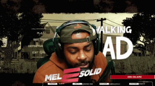 Man Wearing Headphones Playing Walking Dead GIF