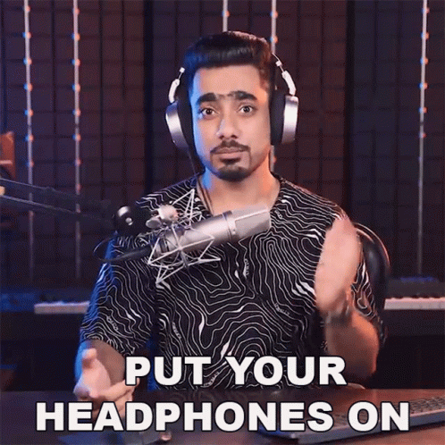 Man Wearing Headphones Saying Put Your Headphones On