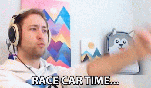 Man Wearing Headphones Saying Race Car Time