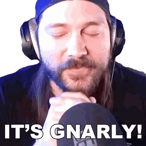 Man Wearing Headphones Says Gnarly