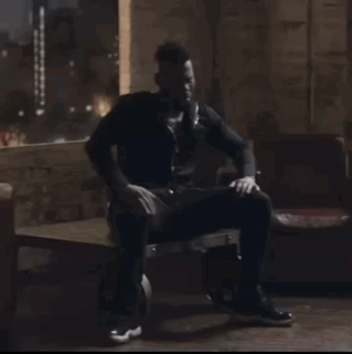 Man Wearing Headphones Sitting GIF